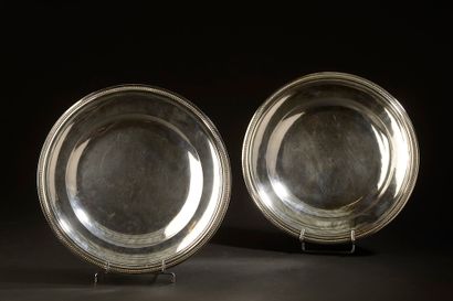 Pair of circular silver dishes, the wing...