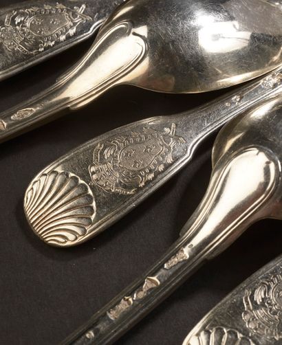 null 
Twenty-one large silver cutlery items with shell pattern, the spatula engraved...