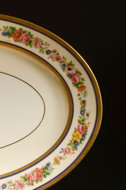 null LIMOGES, HOUSE ROUART.

Part of a porcelain dinner service with rich polychrome...