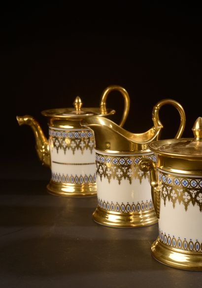 null PARIS.

Part of a porcelain coffee service with neo-Gothic gold and blue frieze...