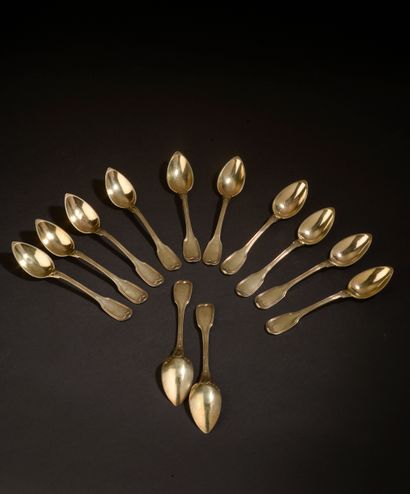 null Suite de douze petites cuillères en argent doré, modèle filet.

Paris, 1819-1838.

Poids...