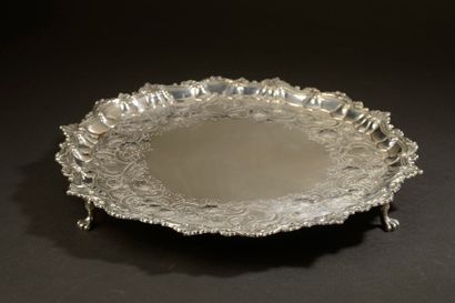 null Large circular silver tray with embossed and engraved decoration of fruits and...
