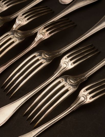 null A set of silver cutlery, with threaded handles and a gadrooned end. It includes...