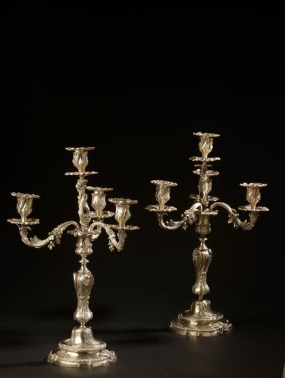 Pair of silver plated candelabras decorated...