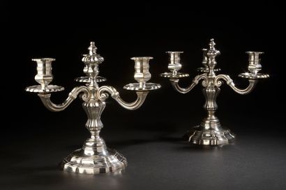 A pair of silver plated bronze candelabras...
