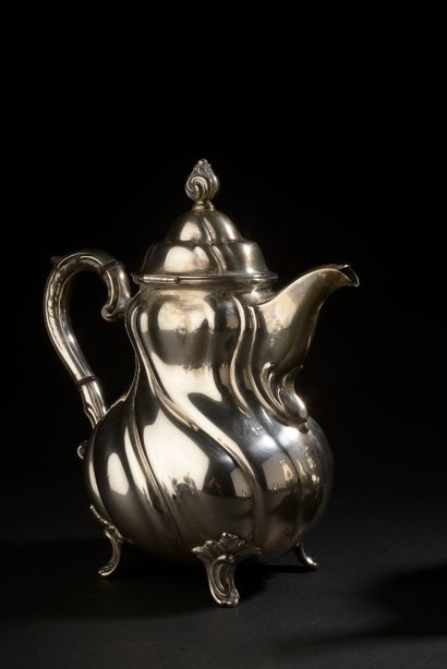 null Part of a silver tea and coffee service with twisted ribs, the grips and the...