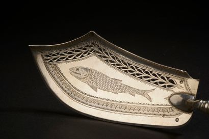 null Fish shovel, the shovel pierced with engraved decoration of a fish, the handle...