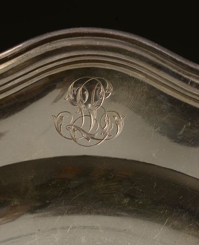null Pair of circular silver dishes with five contours, the wing monogrammed (small...