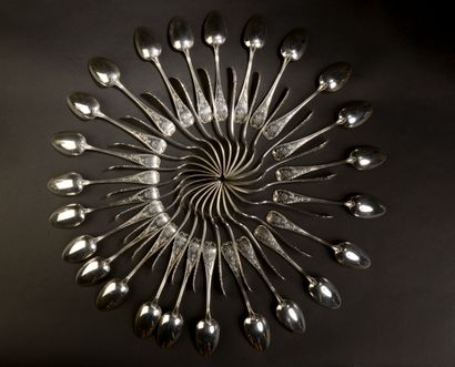Set of twenty-four silver flatware, the handle...