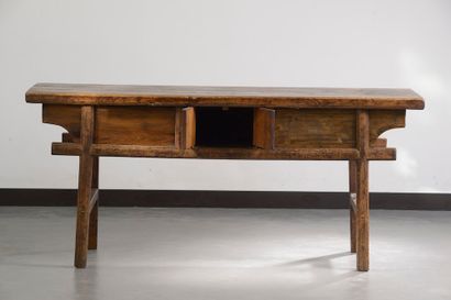 null CHINA, 20th century.

Exotic wood console table opening with a drawer in the...