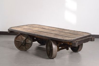 null 
Large coffee table made of an old industrial cart, the rectangular top with...
