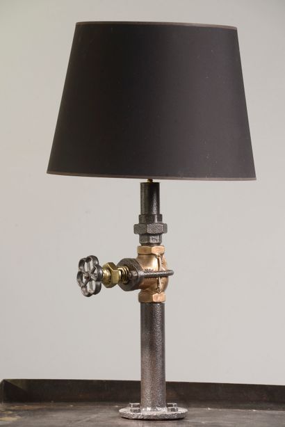 Table lamp in the industrial style, the shaft...