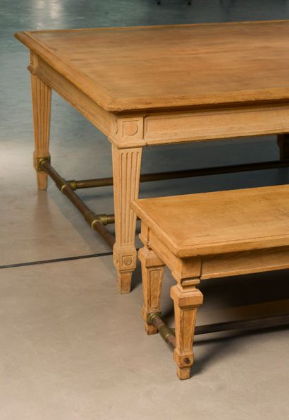 null A large rectangular moulded oak table, the rectangular top edged with a slight...