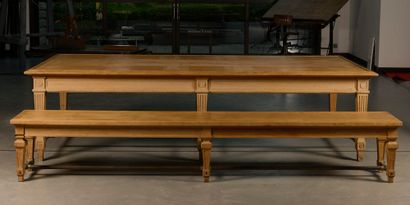 null A large rectangular moulded oak table, the rectangular top edged with a slight...