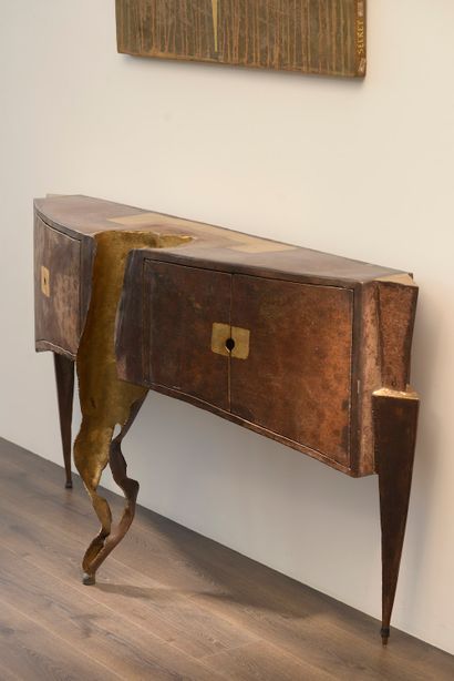 null Jean-Jacques ARGUEYROLLES (born in 1954). 

 Console in patinated metal opening...