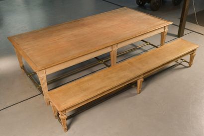null A large rectangular moulded oak table, the rectangular top edged with a slight...
