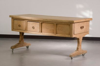 null Table called "trade" in stripped wood, the belt opening with four large drawers...