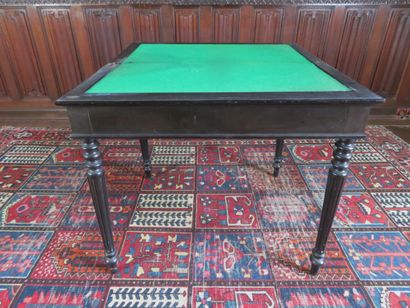 null Set including : 

- blackened wood game table, the top covered with green felt,...