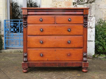 A large natural wood and veneer chest of...
