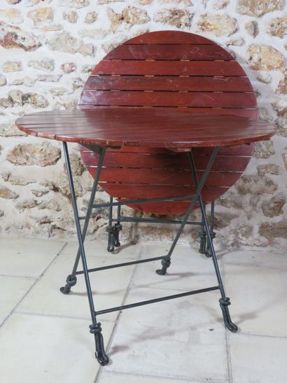 Circular folding table made of natural wood...