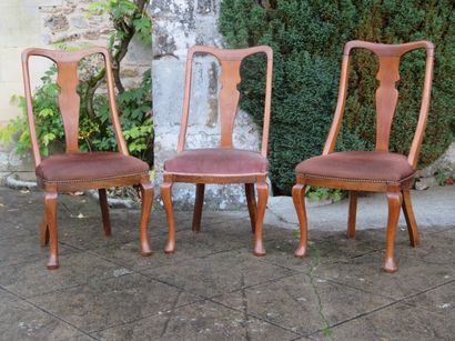 Set of three chairs in natural wood, the...