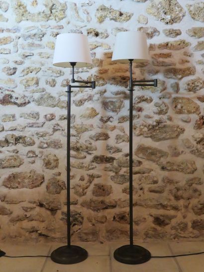 Pair of articulated floor lamps, the straight...