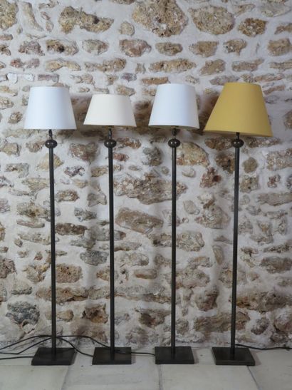 Suite of four floor lamps, the straight shaft...