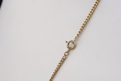 null *18k yellow gold chain with filed curb chain retaining three 

pendants representing...