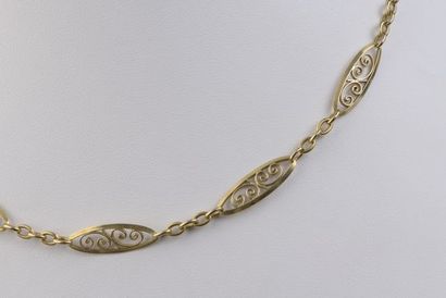 null Necklace in 18k yellow gold with twelve oval filigree links alternating with...