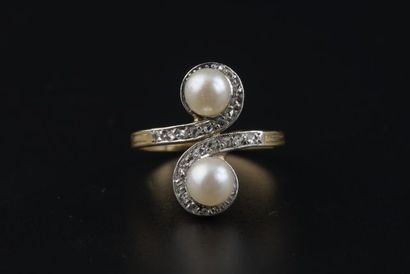 null Ring "Toi Moi" in 18k yellow gold with two cultured pearls, the setting with...