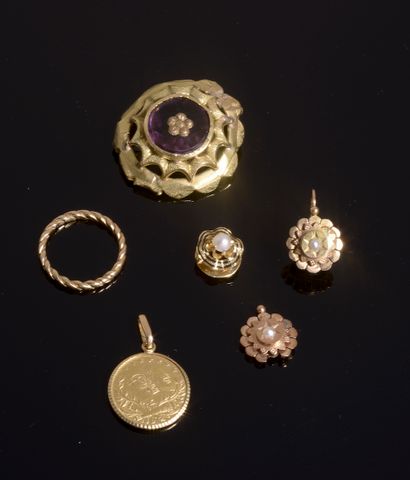 null 18k yellow gold set including: a circular openwork brooch set with a faceted...