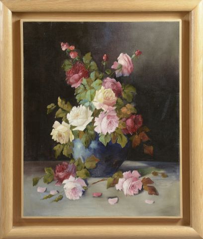 null *École du XXe siècle.

Bouquet de roses dans un vase sur un entablement.

Huile...