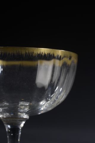 null 
*Parts of blown crystal glass services, the border with gilded combs (wear...