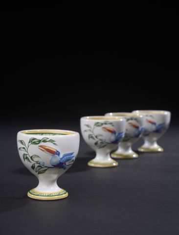 null HERMÈS.

Suite of four egg cups in porcelain of Moustiers with polychrome decoration...