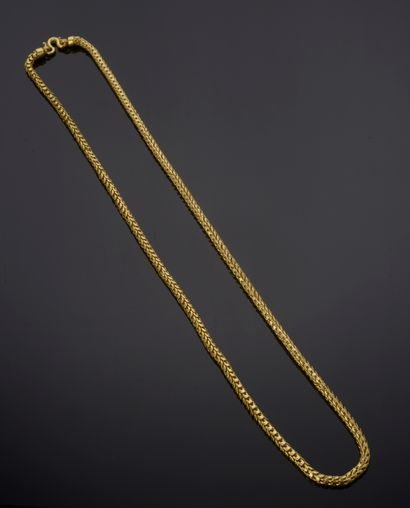 null Collier en or jaune 18k à maille serpent, le fermoir crochet.

Long. : 65 cm...