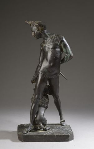null Georges DE CHEMELLIER (1835-1907).

Clown with a poodle.

Bronze with brown...