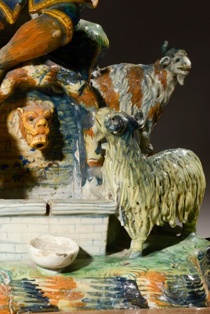 null Small polychrome enameled earthenware fountain representing a shepherd playing...