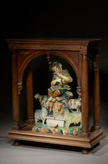null Small polychrome enameled earthenware fountain representing a shepherd playing...