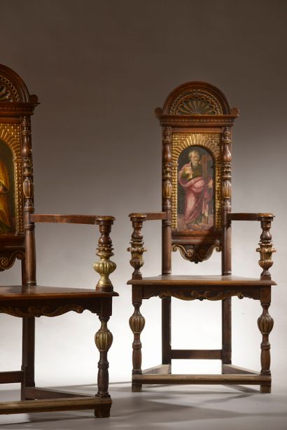 null 
Pair of walnut caquetoires, the uprights carved with gadrooned balusters, the...