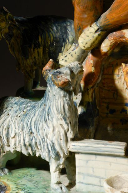null Small polychrome enameled earthenware fountain representing a shepherd playing...