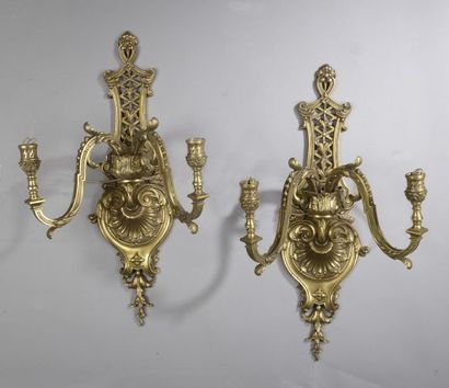 null Important pair of ormolu sconces (pitting) with two arms of light foliated and...
