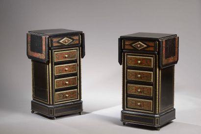 null Pair of bedside cabinets on wheels with side flaps in black lacquered wood veneer...