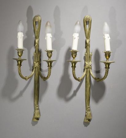 Pair of ormolu sconces with two twisted arms...
