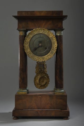 Portico clock in mahogany veneer, the dial...