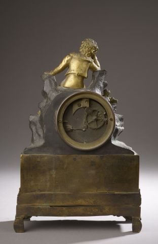 null Small patinated and gilt bronze clock, a dreaming child sitting on the dial...