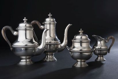 null Tea and coffee set in silver plated metal with friezes of gadroons, the fretel...