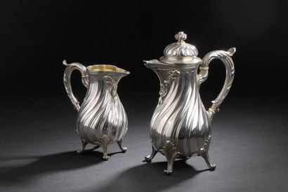 null CHRISTOFLE.

Coffee pot and milk jug in silver plated metal. The bodies with...