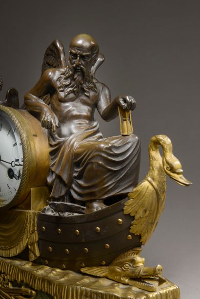 null Patinated and gilt bronze clock representing Cronos in a boat driven by Eros....