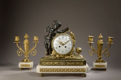 null White marble and gilded bronze mantel set. The clock with a circular enamelled...