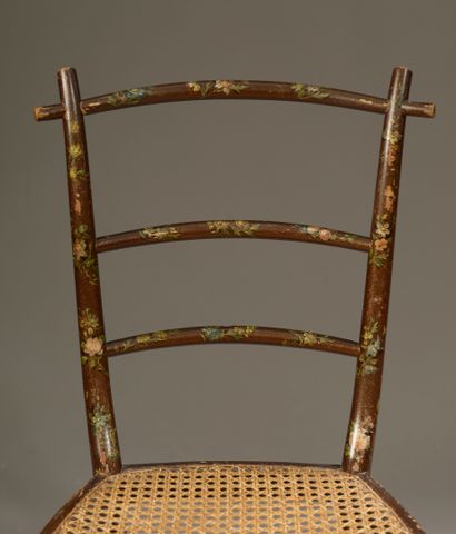 null Pair of caned chairs in lacquered and painted wood decorated with flowers (wear)....